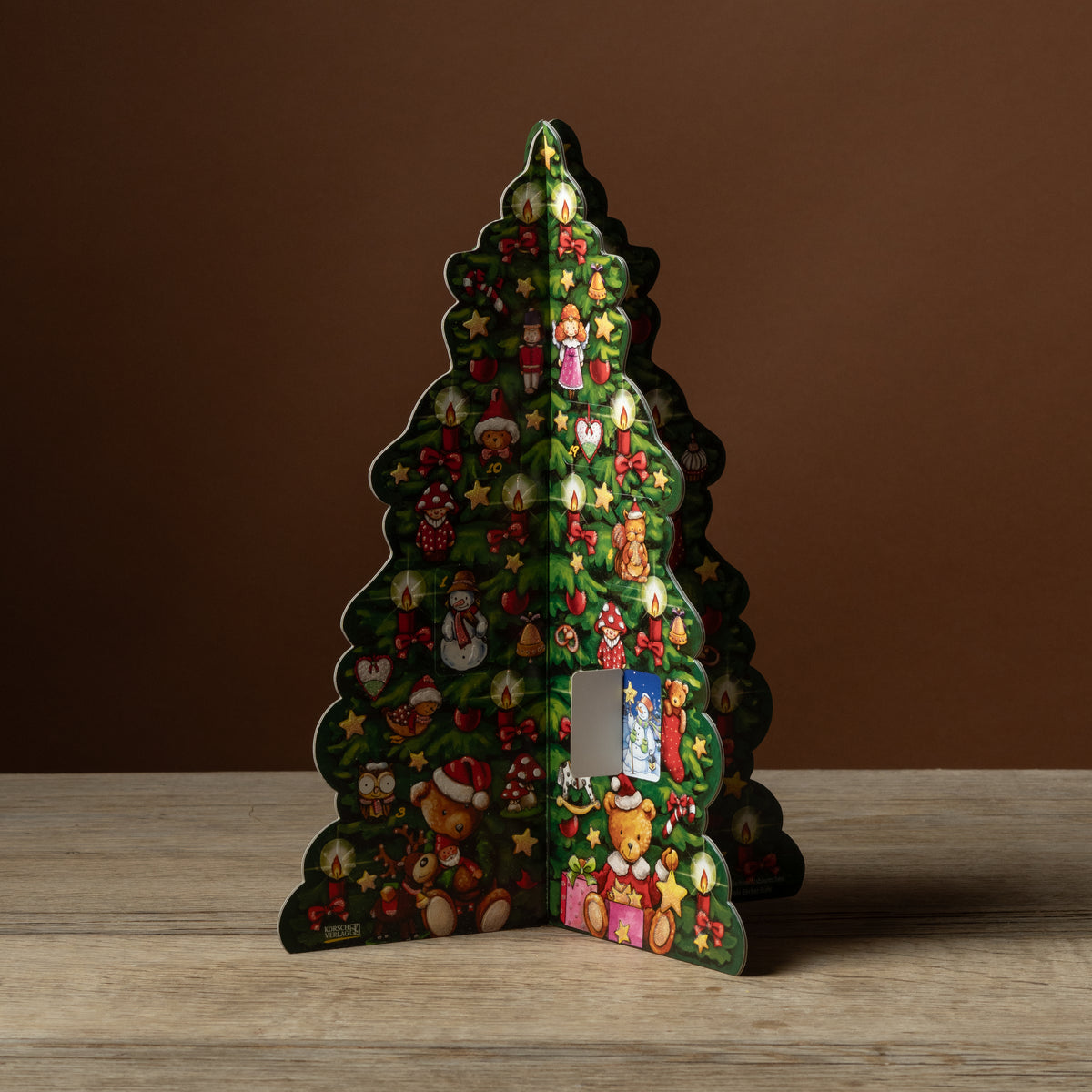 Korsch Verlag Advent Stand-Up Tree, a three-dimensional illustrated Christmas tree calendar with glitter accents.
