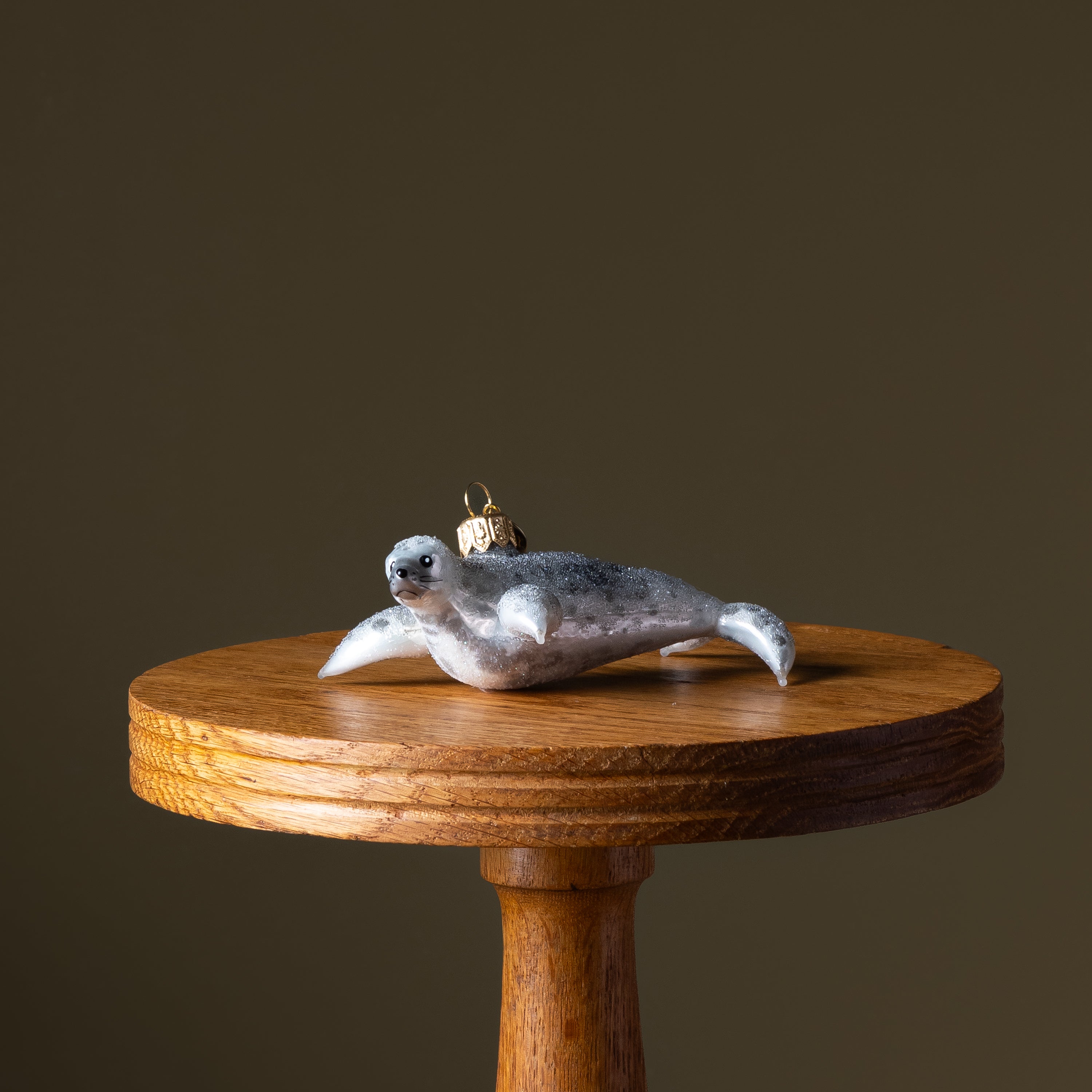 Spotted Snow Seal Glass Ornament