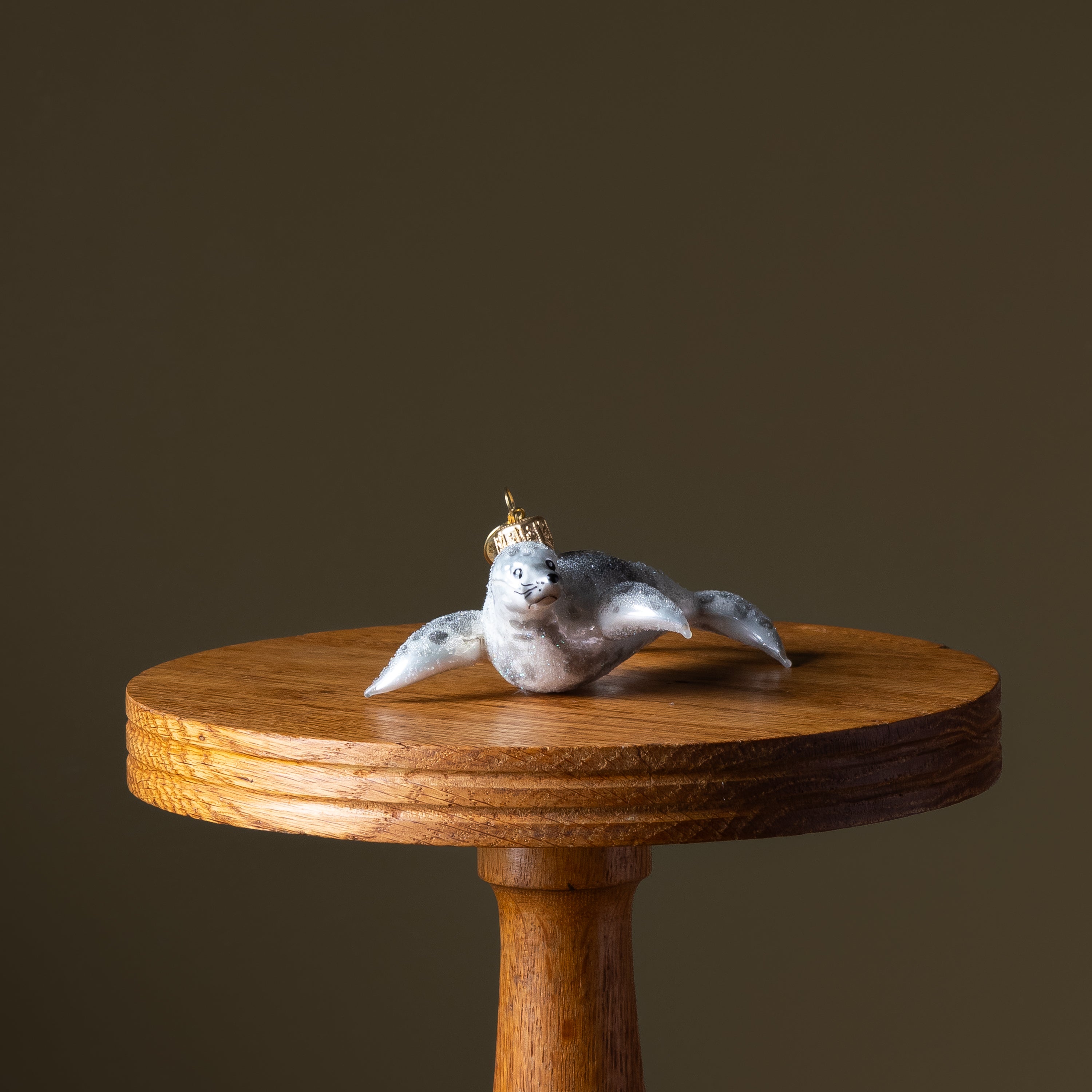 Spotted Snow Seal Glass Ornament