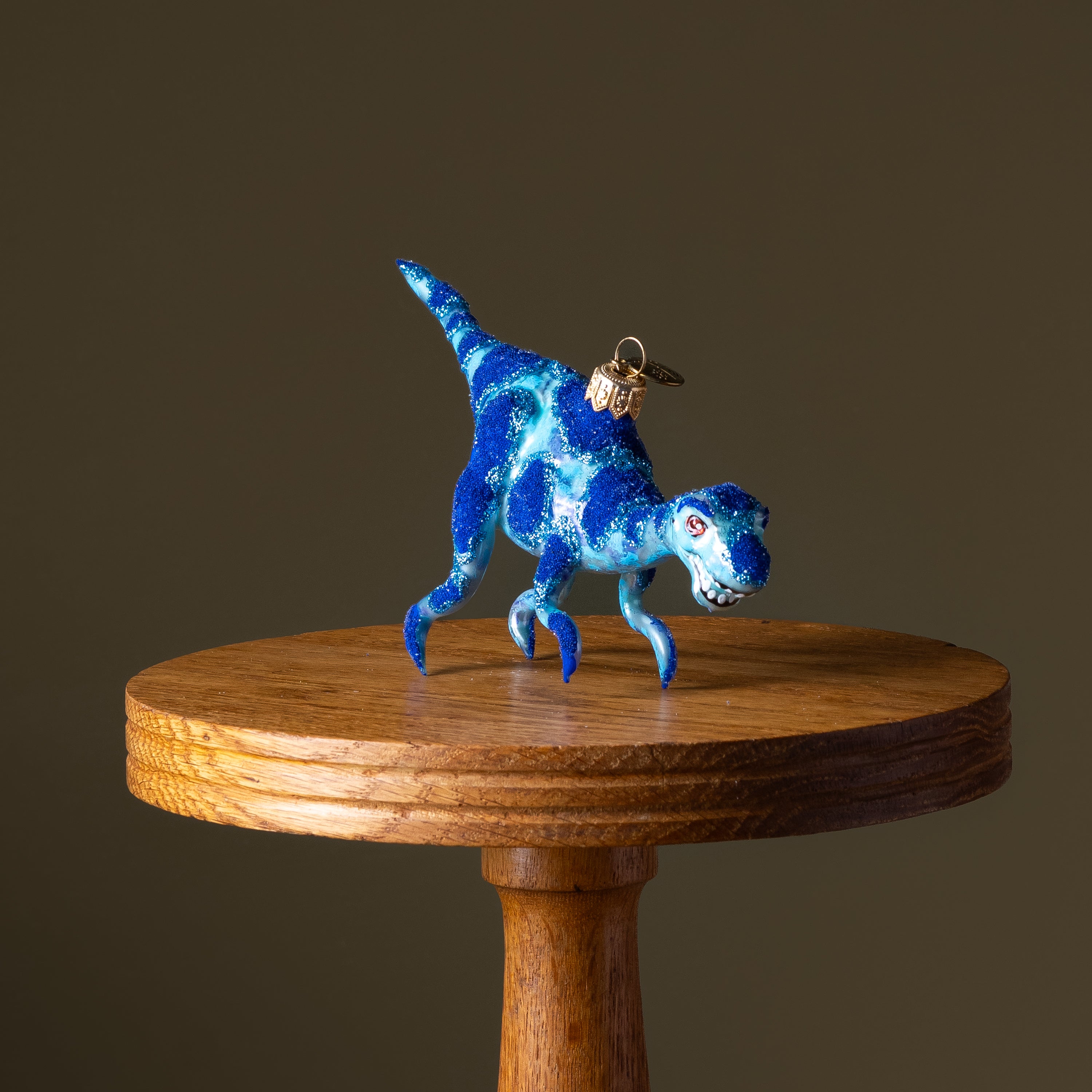 Blue Velociraptor Glass Ornament