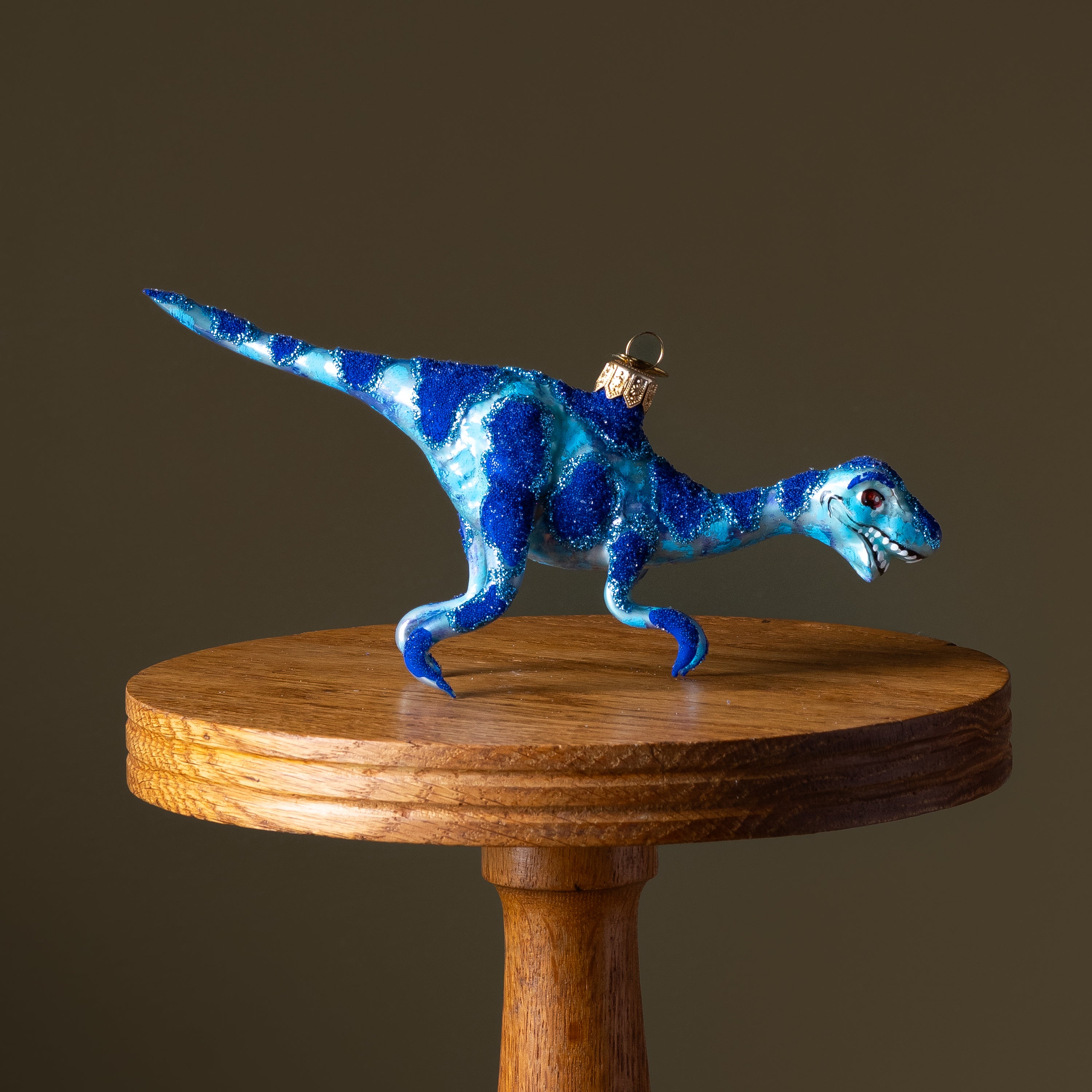 Blue Velociraptor Glass Ornament