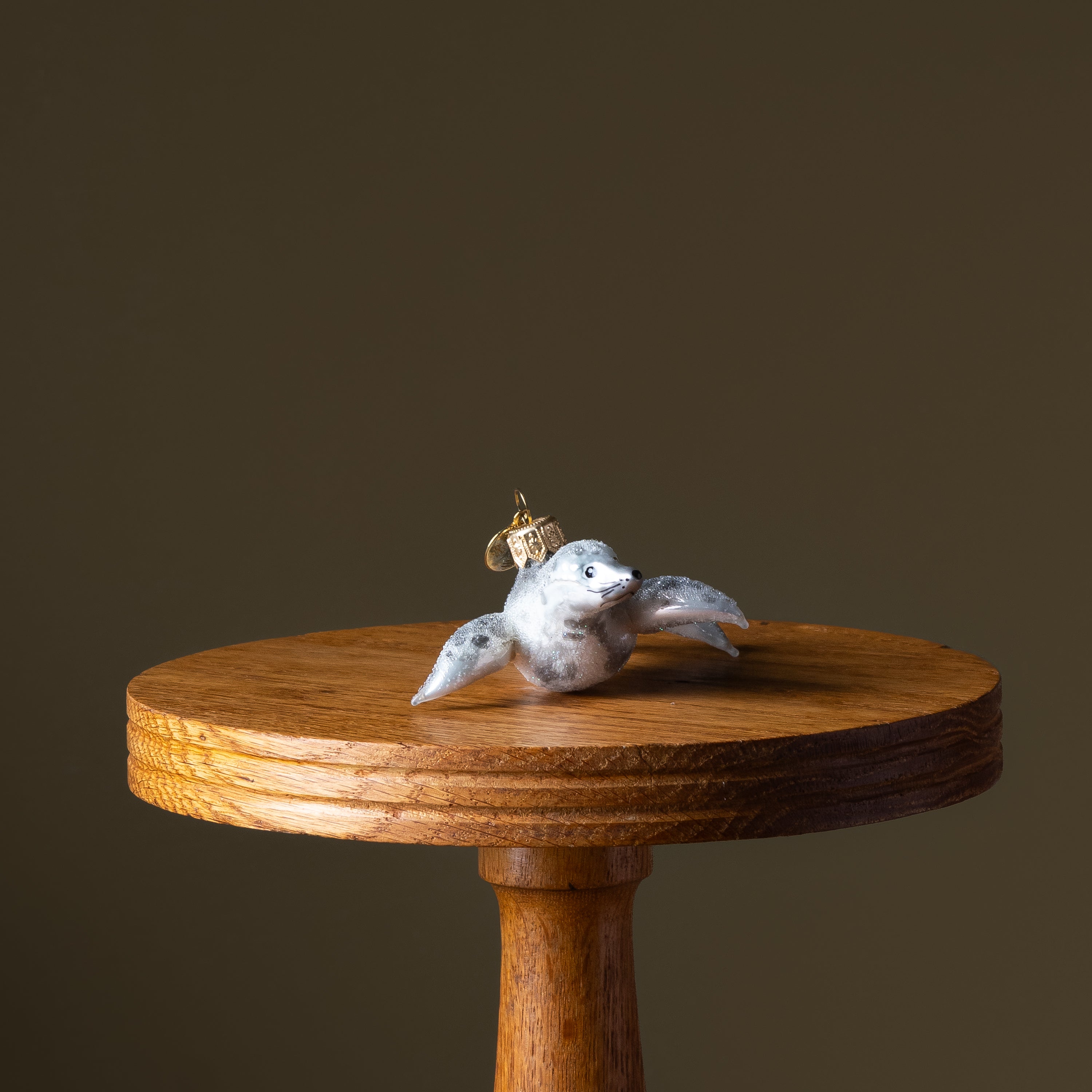 Spotted Snow Seal Glass Ornament