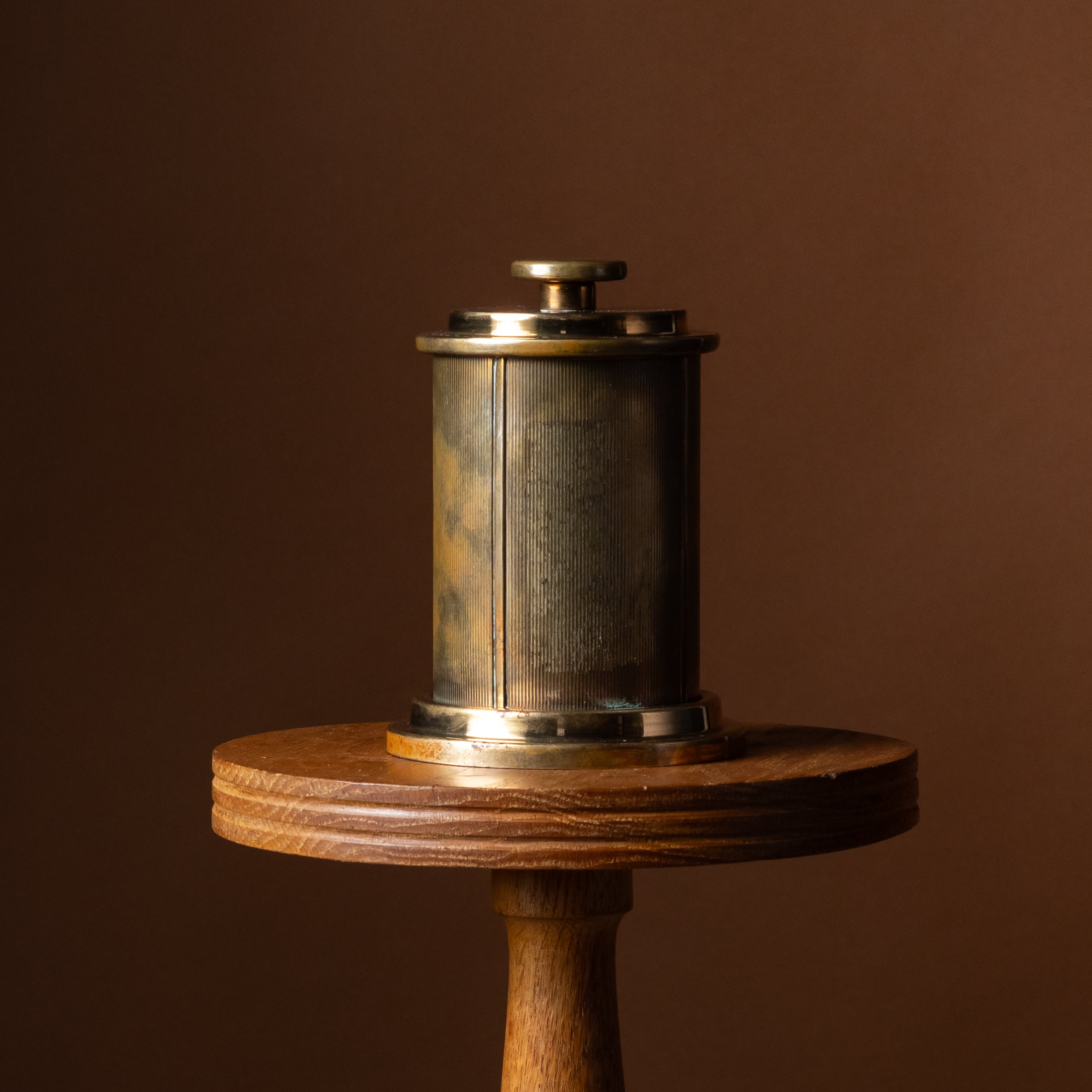 Round Brass Pull-Top Cigarette Dispenser